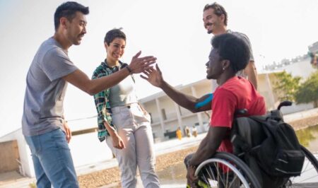 Group of mentees high fiving